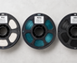 PLA, PETG and ABS filament spools compared side by side